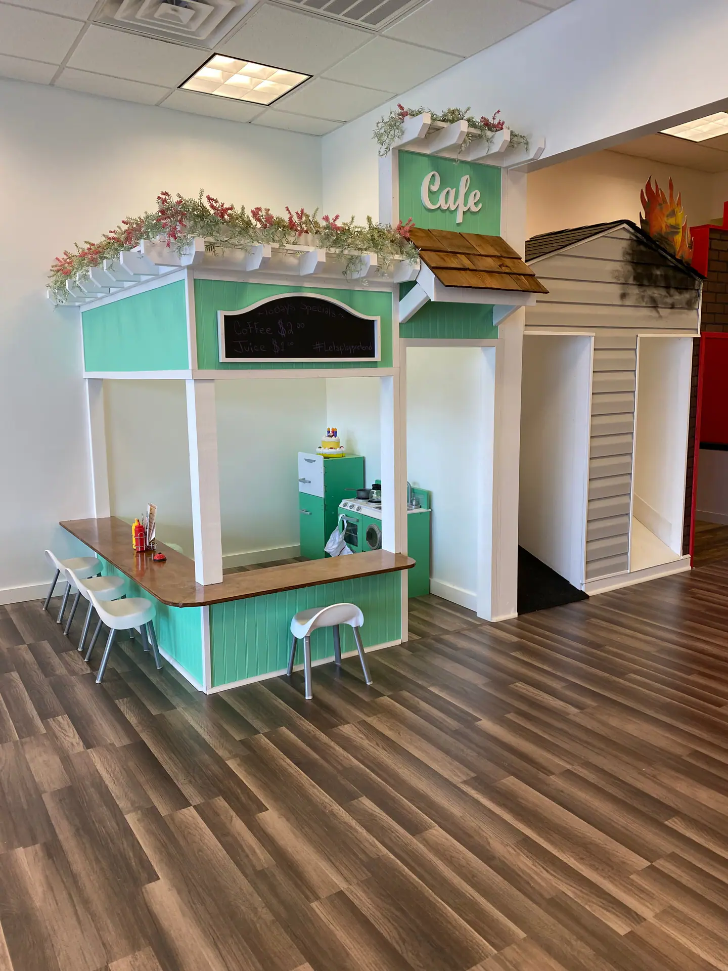 Indoor play scenes at Let's Play Pretend
