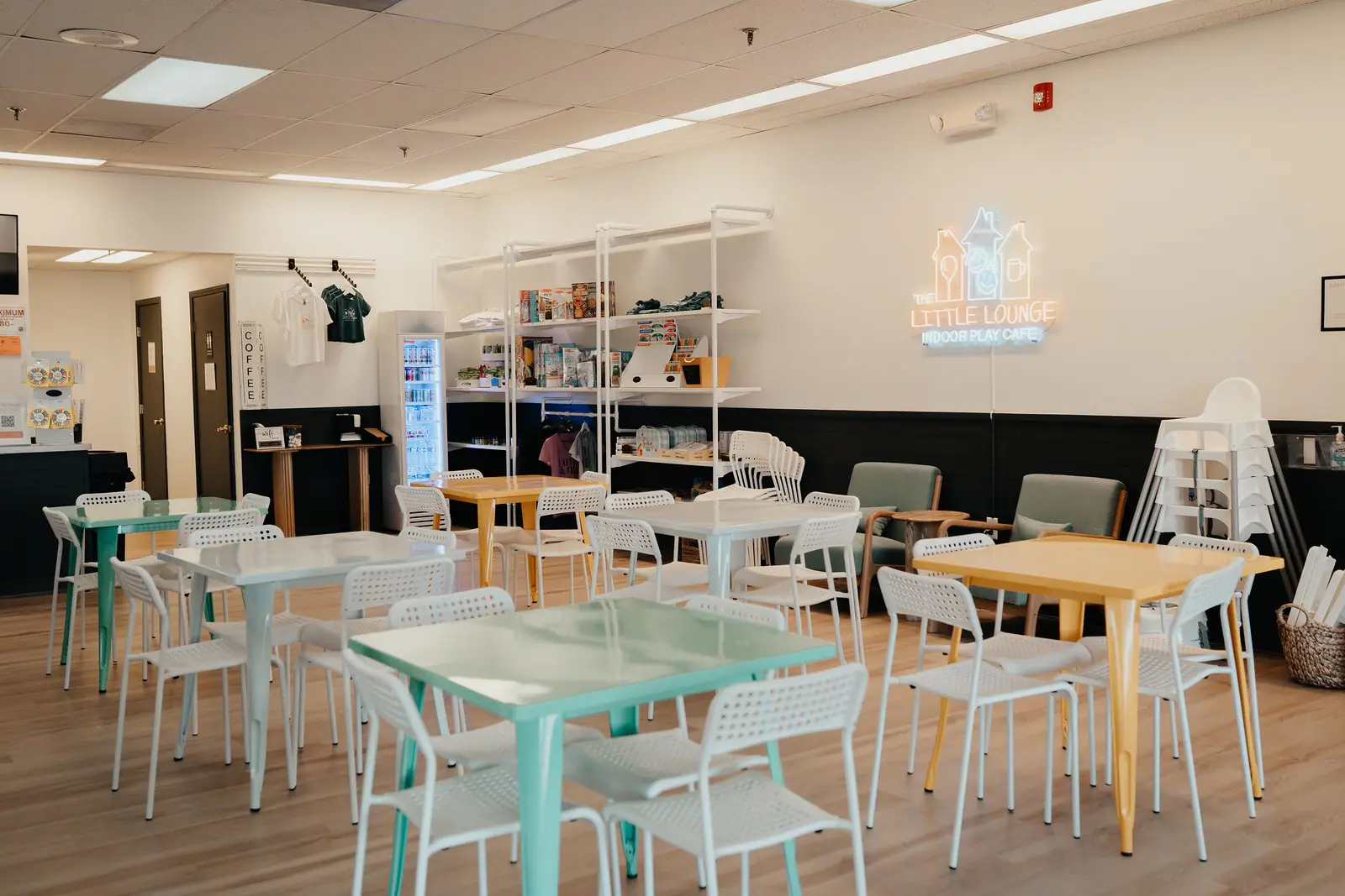 Cafe-style seating area at The Little Lounge.