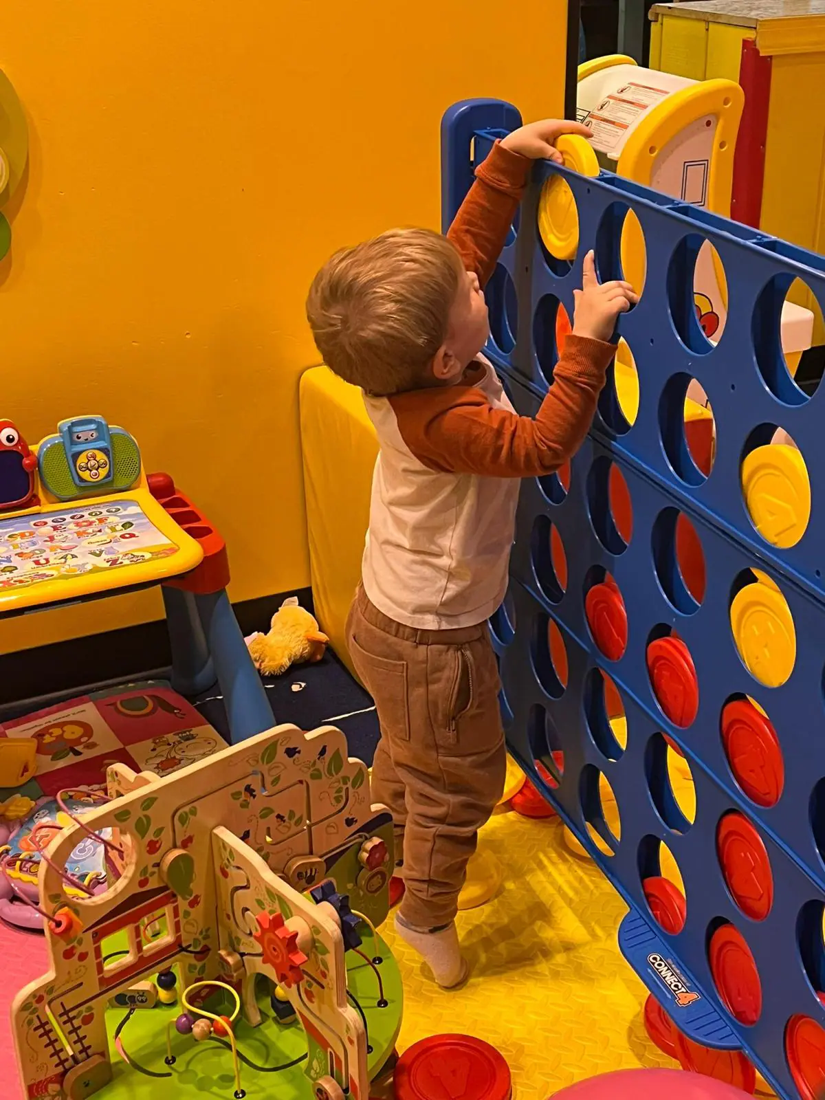 Activity wall inside Lil Bunny Play