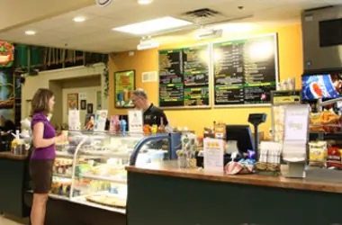 Cafe counter and snack area inside Jungle Java Clinton Township.