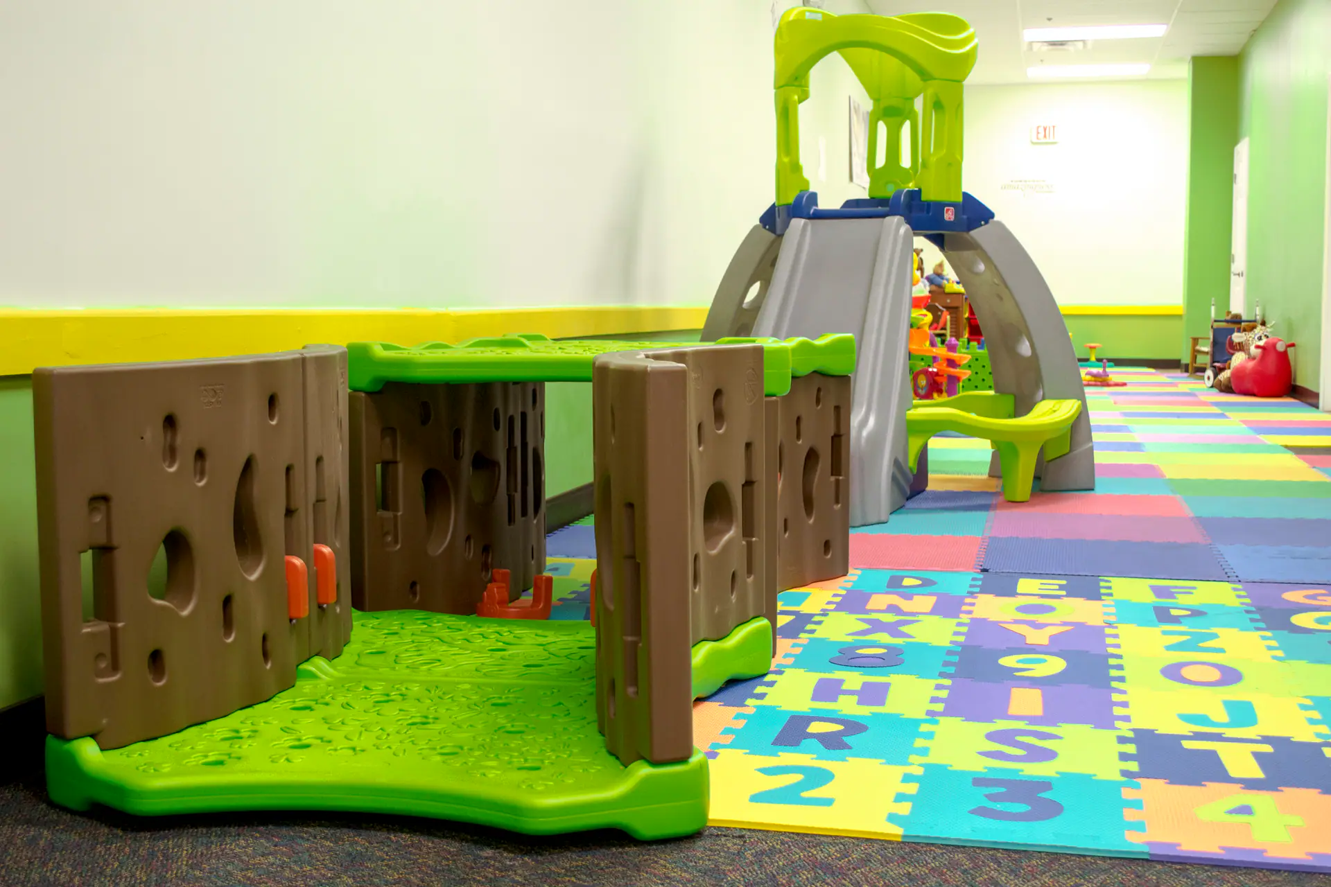 Slides and tunnels at POP Through Play Gym