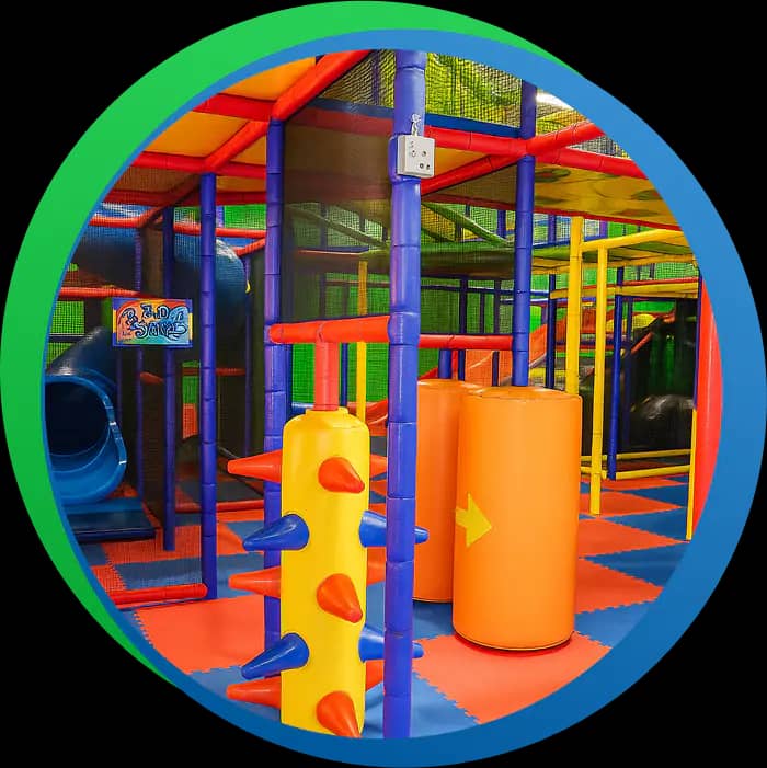 Colorful multilevel play structure inside Luv 2 Play Stockton.