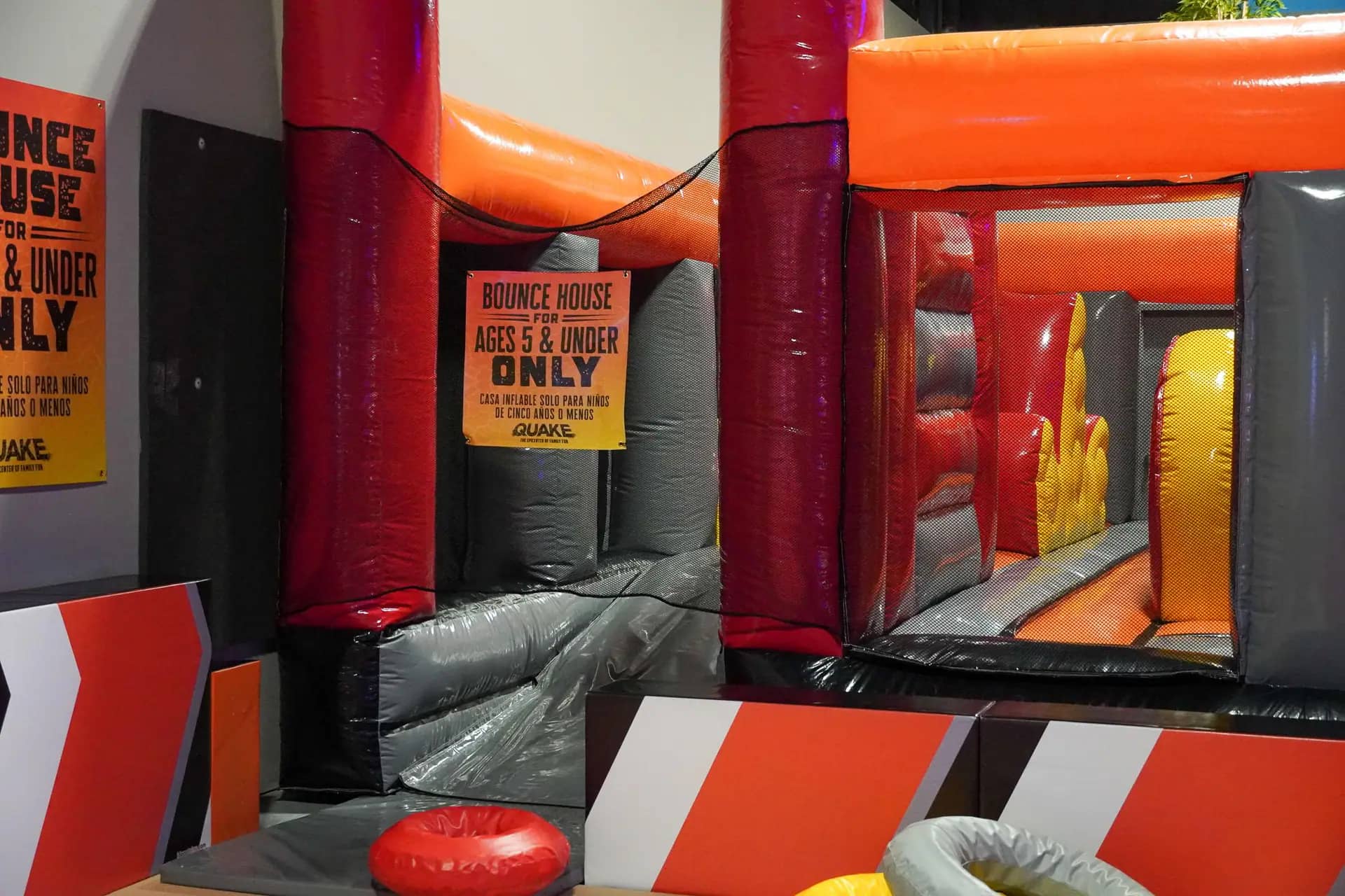 Inflatable and toddler play attractions at Quake Family Fun Center.
