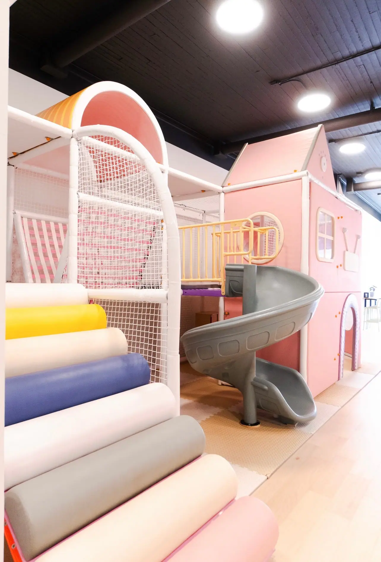 Indoor playhouse and slide setup inside Urban Brew's Martinsville play café.