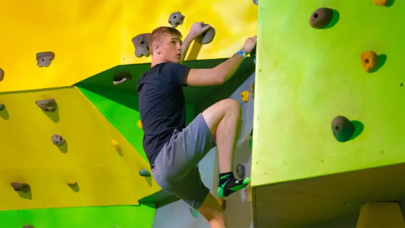 Indoor climbing wall attraction at Launch Brooklyn.
