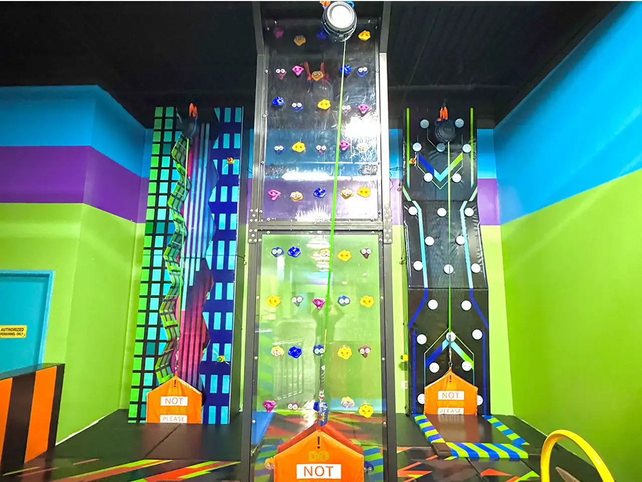 Climbing wall area at Jump City Trampoline Park.