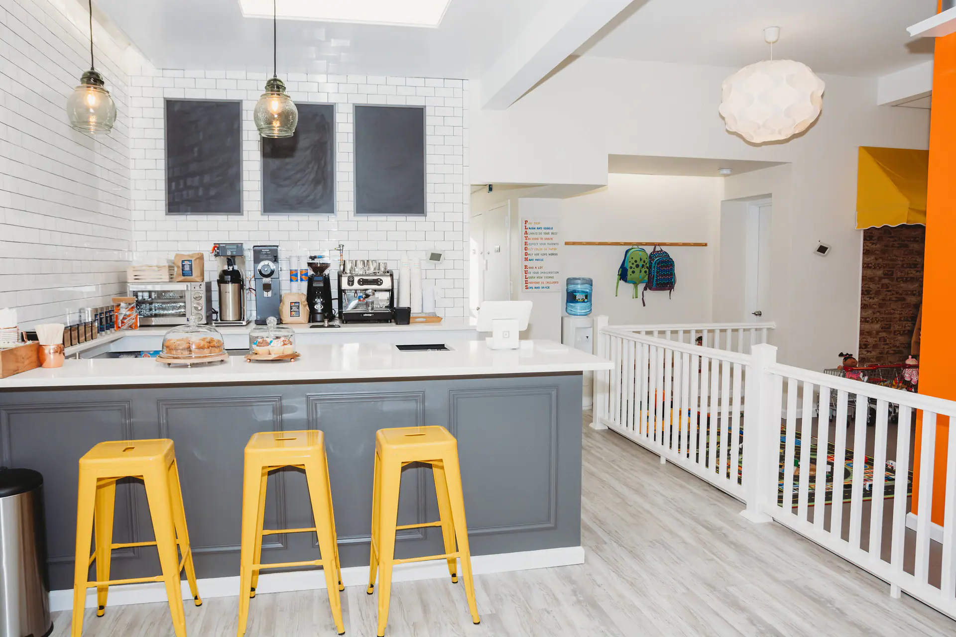 Children's play setup inside Sippy Cups Cafe.
