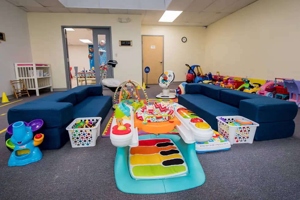 Baby and toddler lounge-style play area at Let's Bee Kids PlayCenter.