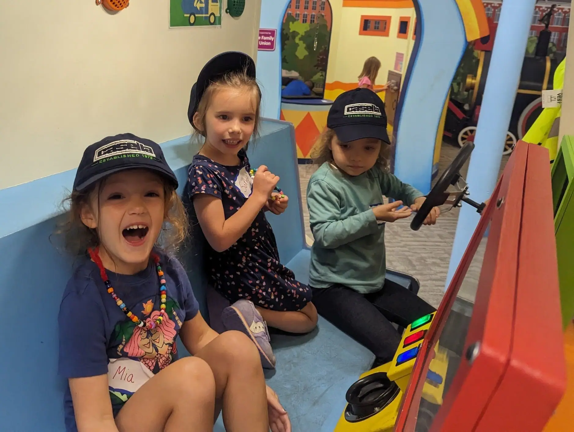 Children playing inside one of the interactive exhibit spaces at Wonderfeet Kids' Museum.