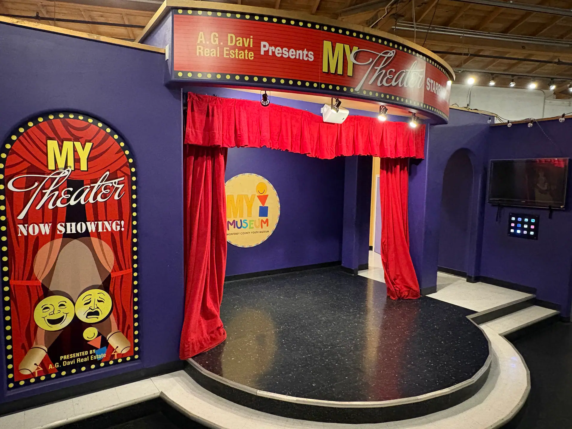 Children in the theater exhibit at MY Museum.
