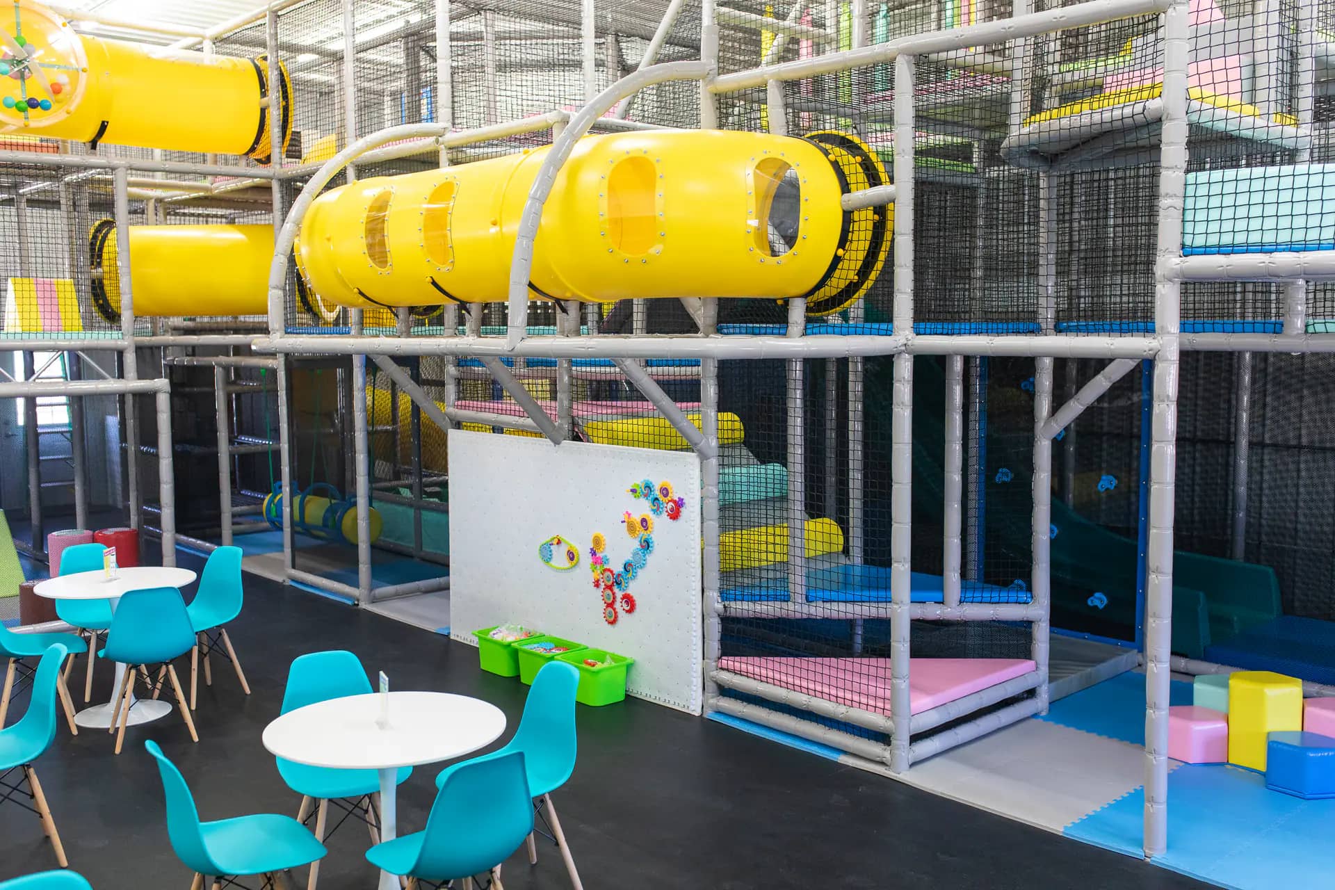 Indoor climbing and play elements inside KinderZone in Orange City.