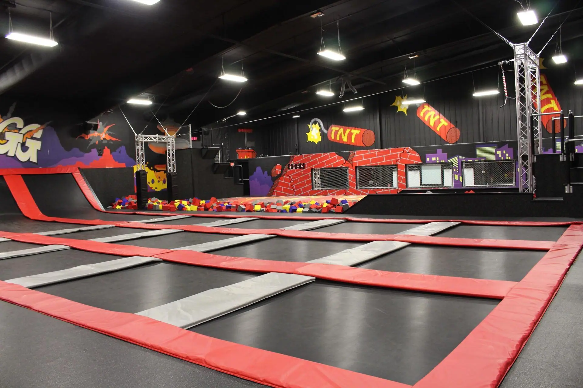 Trampoline courts and foam-pit area at DEFY Jackson