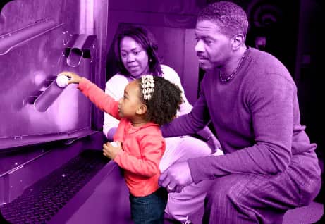 Children exploring exhibits at DISCOVERY Children's Museum.