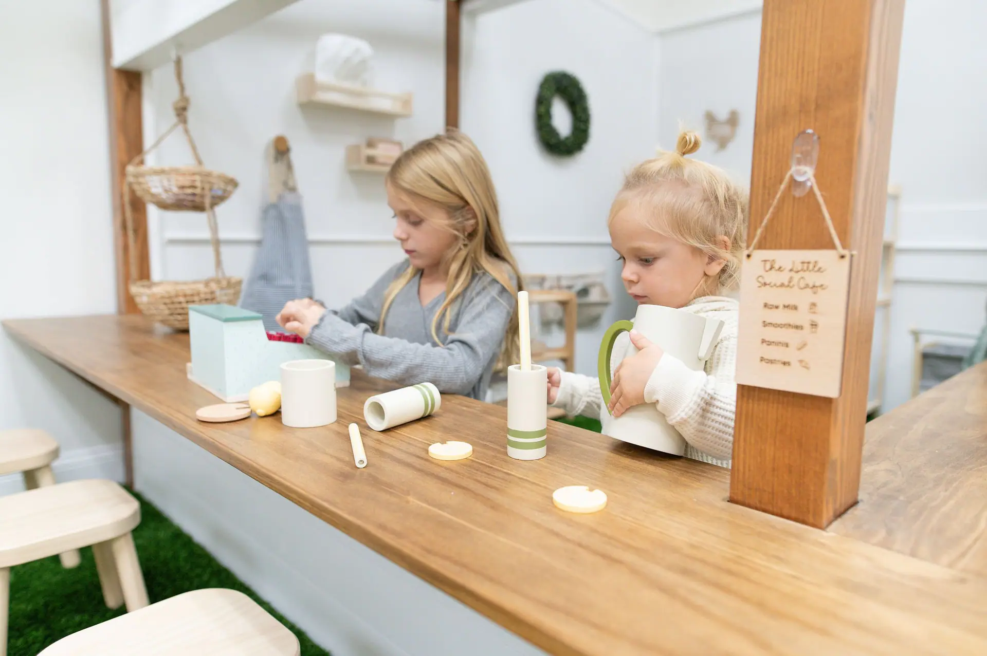 Pretend play kitchen setup inside The Little Social.