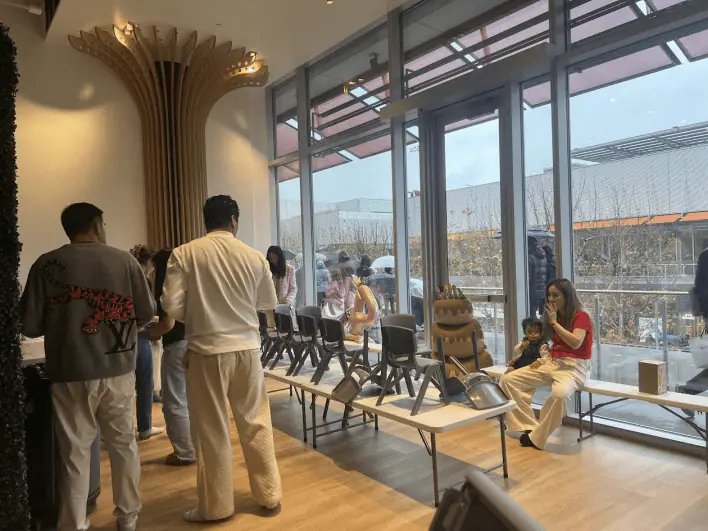 Adult seating area overlooking Kidplex play zones.