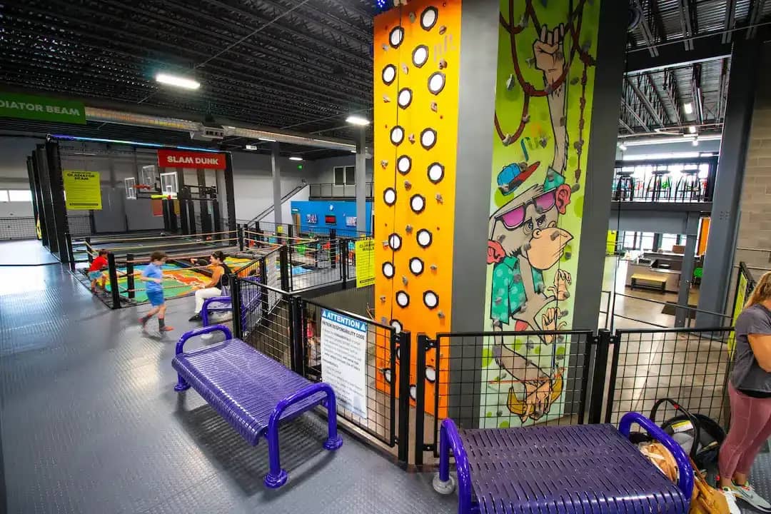 A wide view of trampoline courts inside Trampoline Zone & Adventure Park.