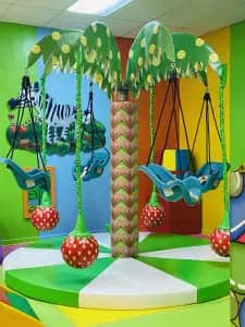 Swing area inside Fun 4 Kidz Playground at Woodland Hills Mall.