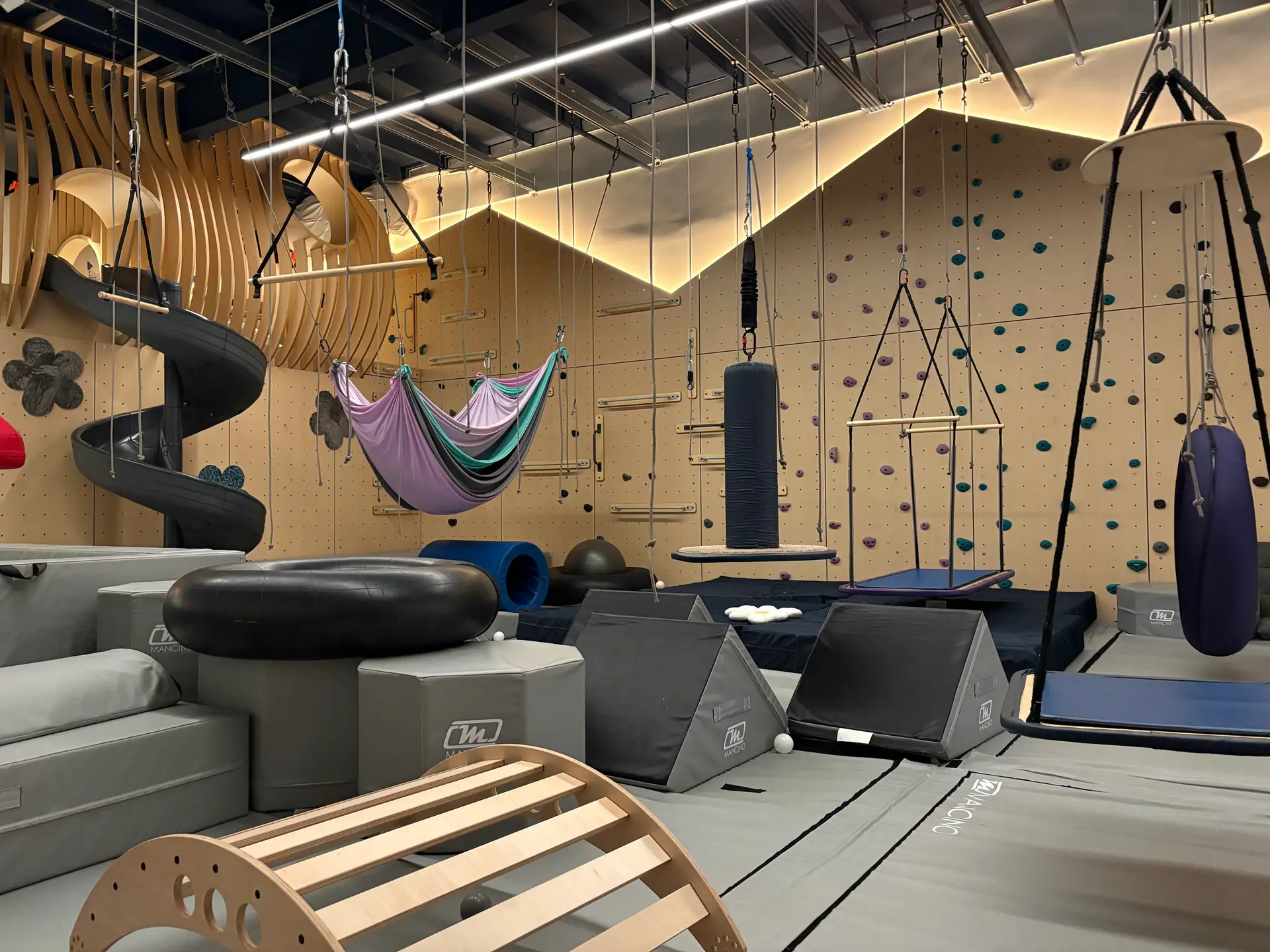 Sensory-motor play setup inside GroWild Boutique Playroom in Camas