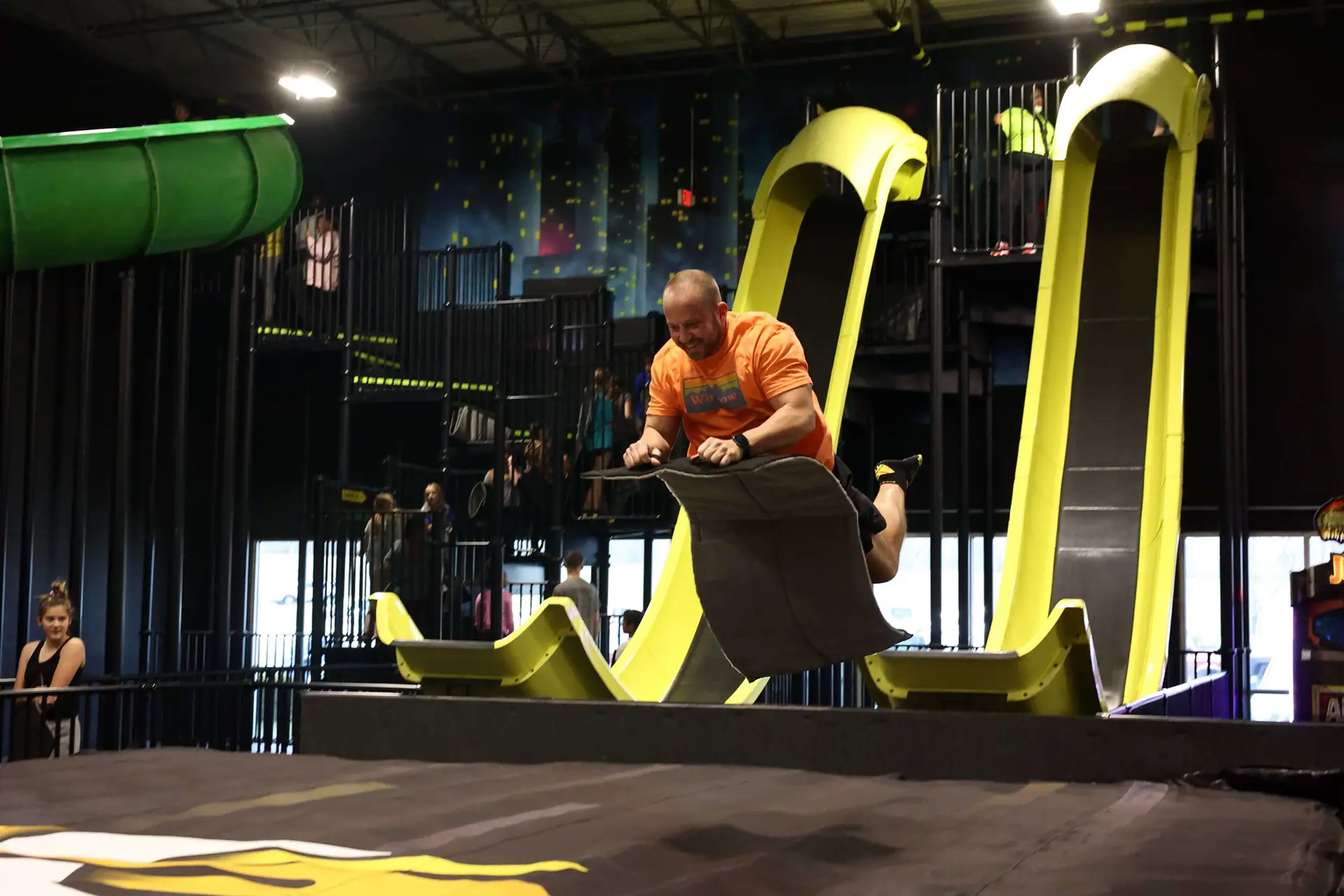 Slide attraction inside Slick City Nashville