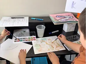 Child-focused activity table at CrunchTime Collective
