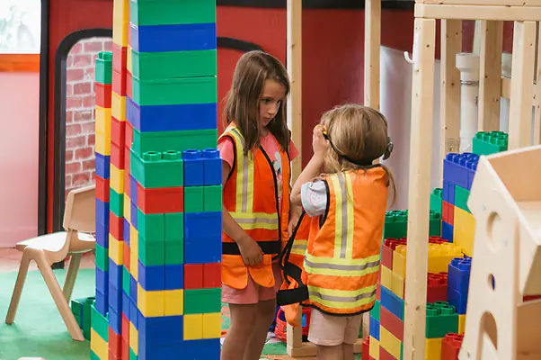 Children using imaginative play setups at Sensory Seekers.