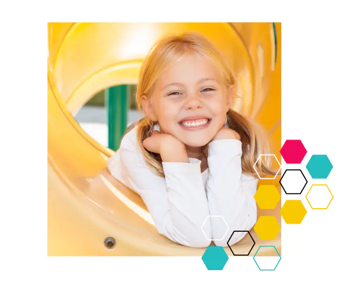 Children playing on an indoor slide at Play Boutique in Lake Oswego