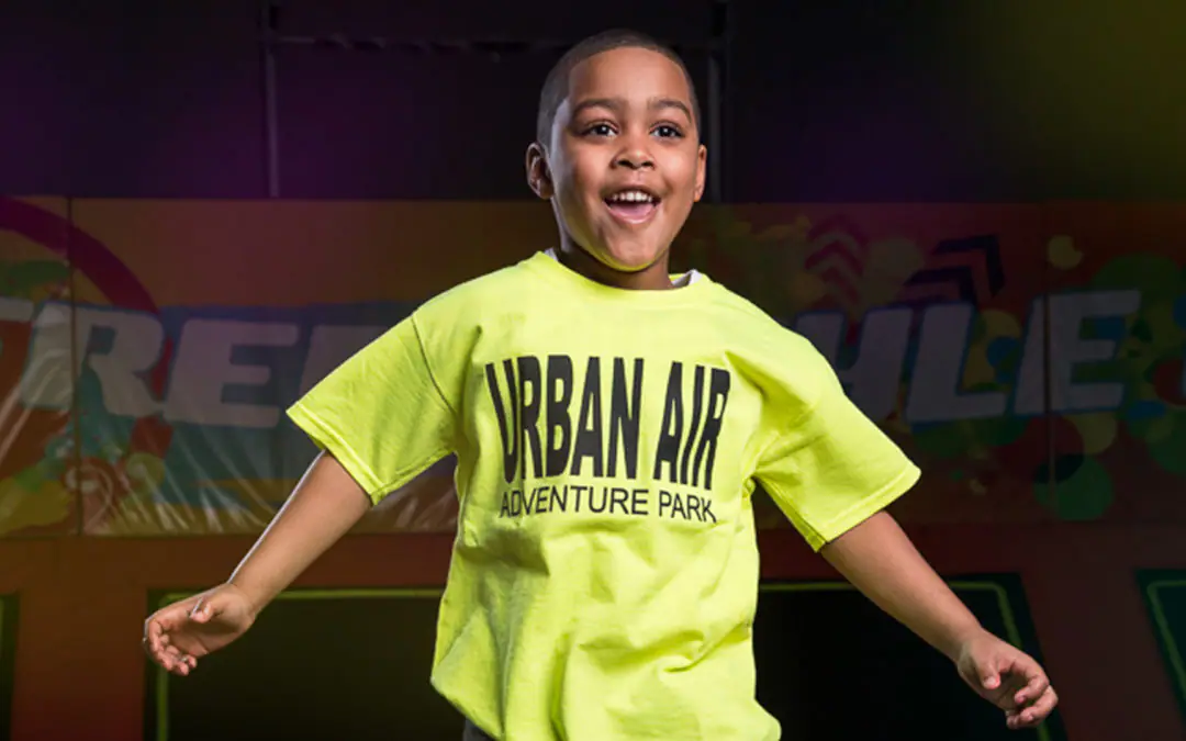 Young child playing in the Kids Area 7 and Under attraction at Urban Air Midland.