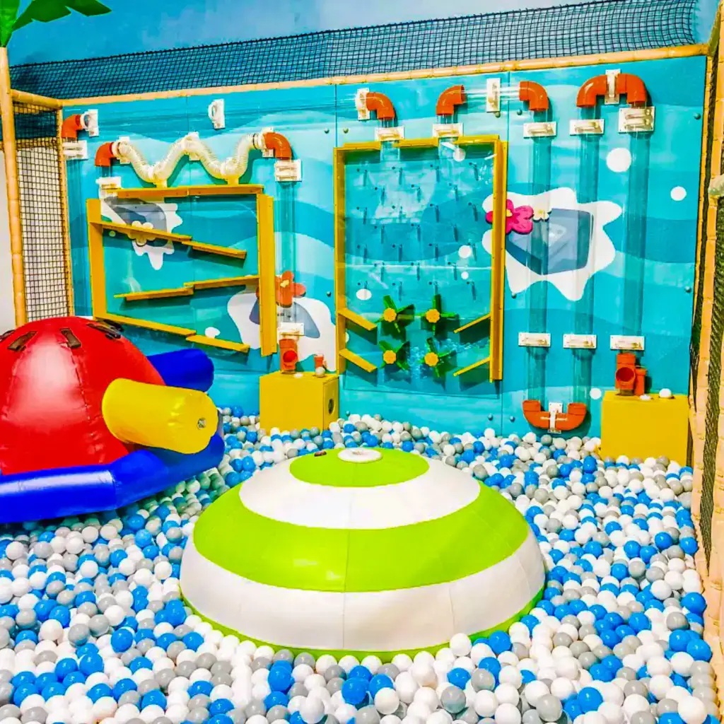 A child exploring the play environment at Me Land - Frederick.