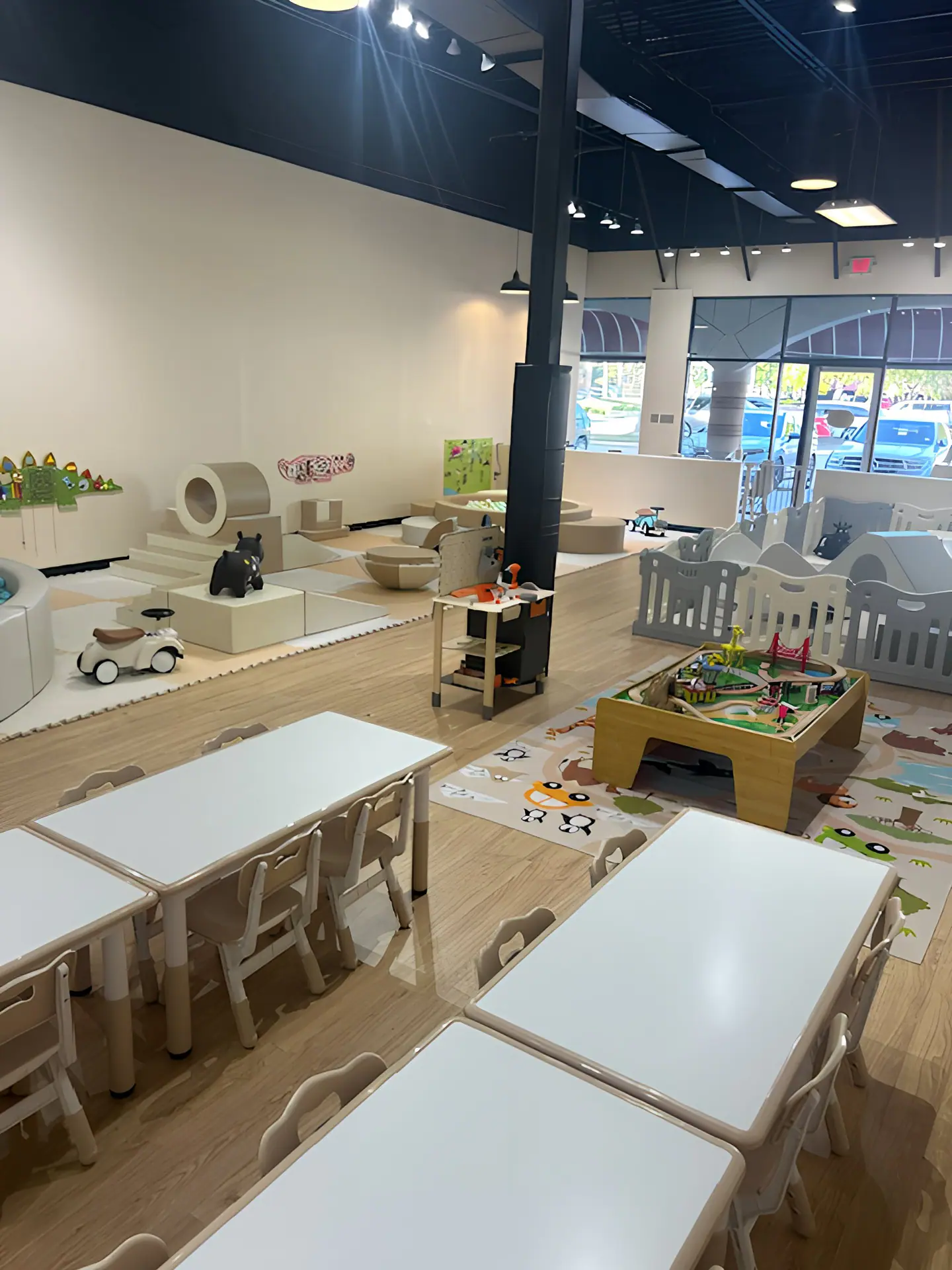 Soft-play equipment and ball-pit-style play areas inside Tiny Pits and Play in Missouri City.