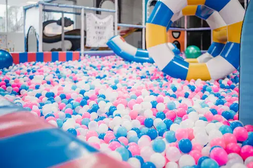 PlayPalz ball pit and soft-play area with pastel play balls.