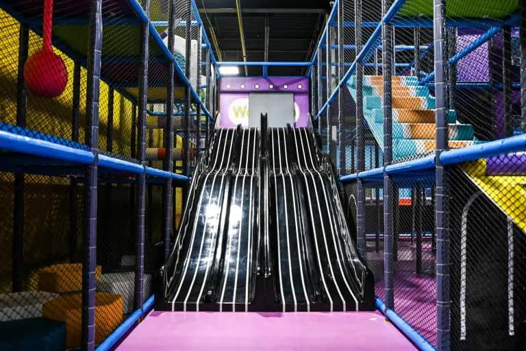 Multi-lane indoor slides at Fun Zone Trussville.
