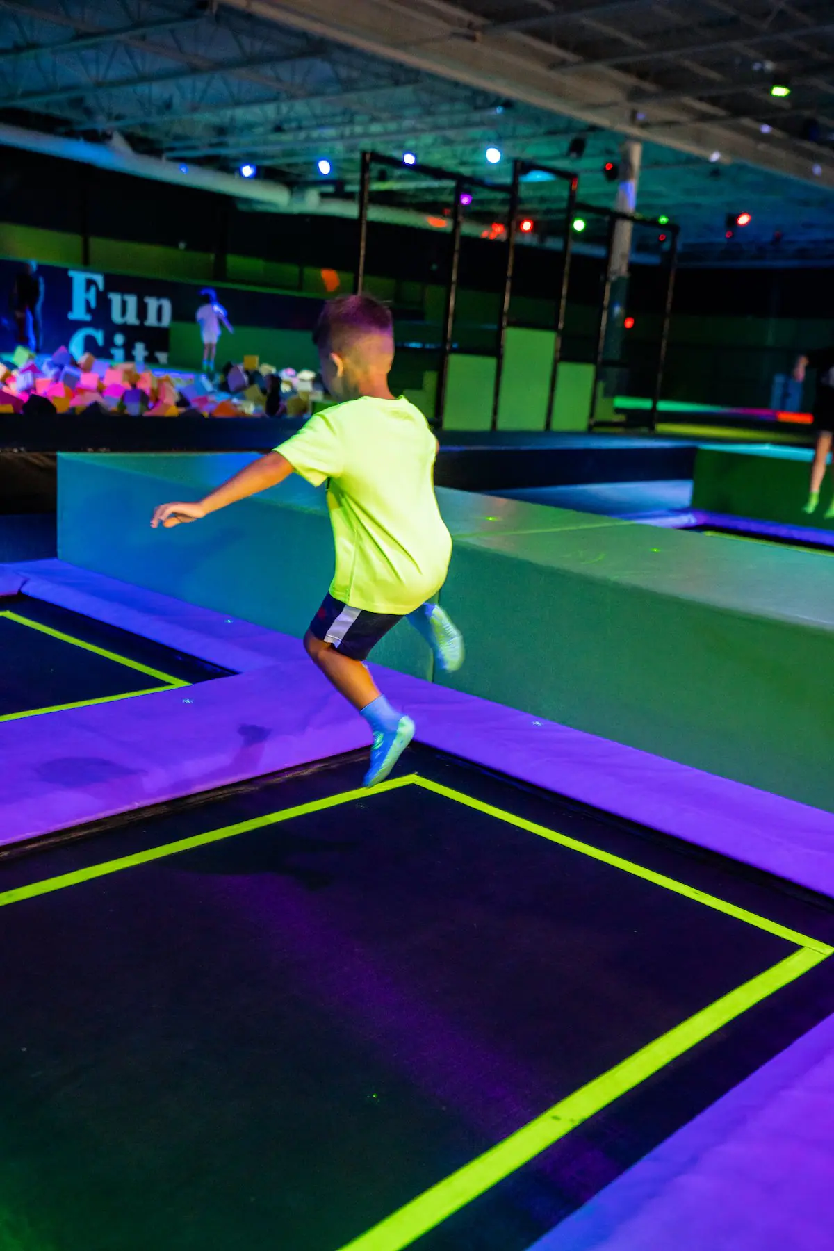 Children jumping and playing in the trampoline and adventure zone at Fun City Adventure Park Columbus.