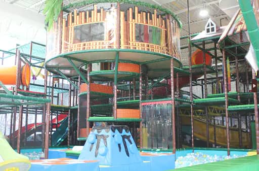 Indoor climbing structure and ball area at Me Land