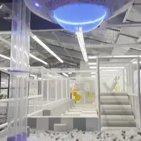 White ball pit and slide area at Kids City Adventure Honolulu