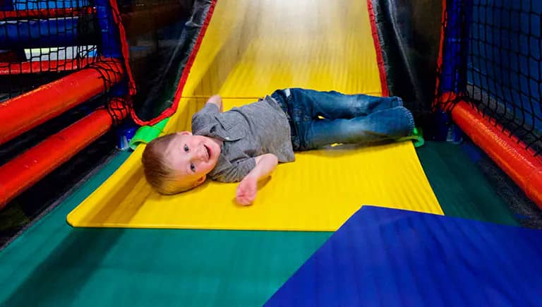 Slides inside the play maze at The Fun Station - Quad Cities.