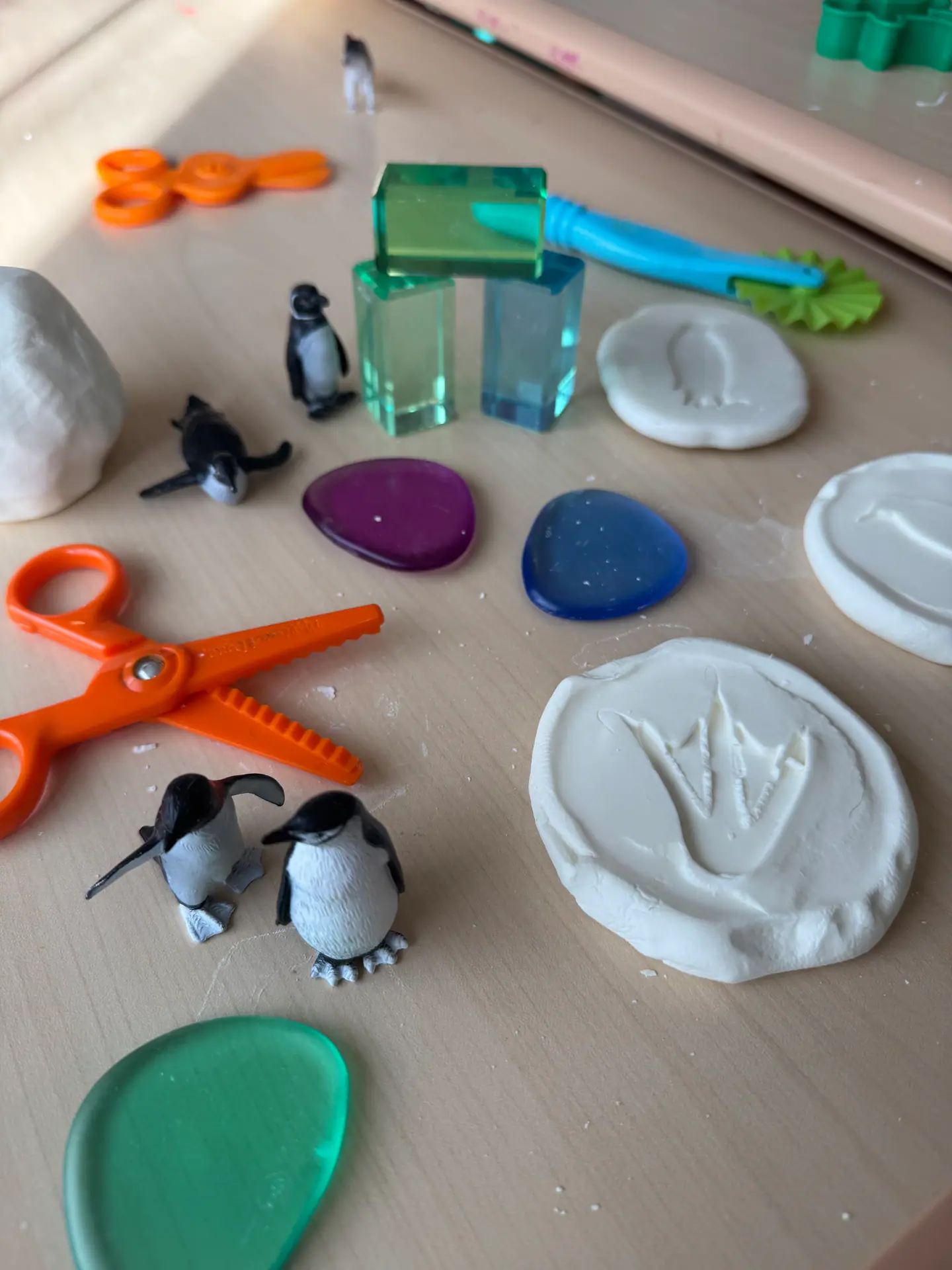 Tabletop sensory and fine-motor setup at Blossom Play Space.