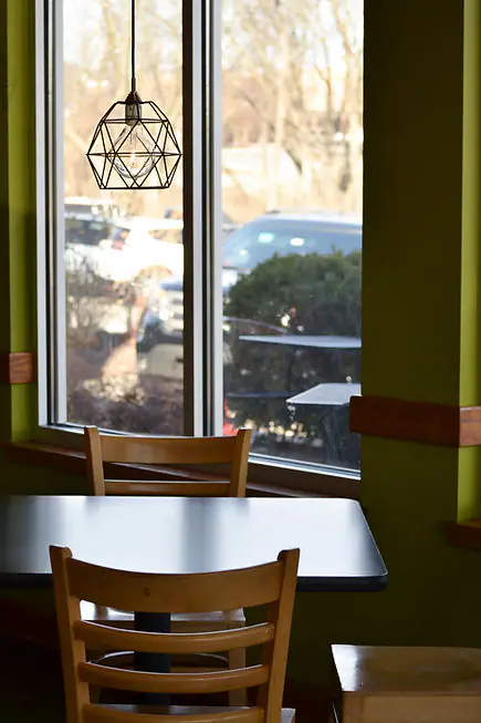 Coffeehouse interior and family-friendly gathering space at Foundry Coffeehouse and Play Room in Lenexa.