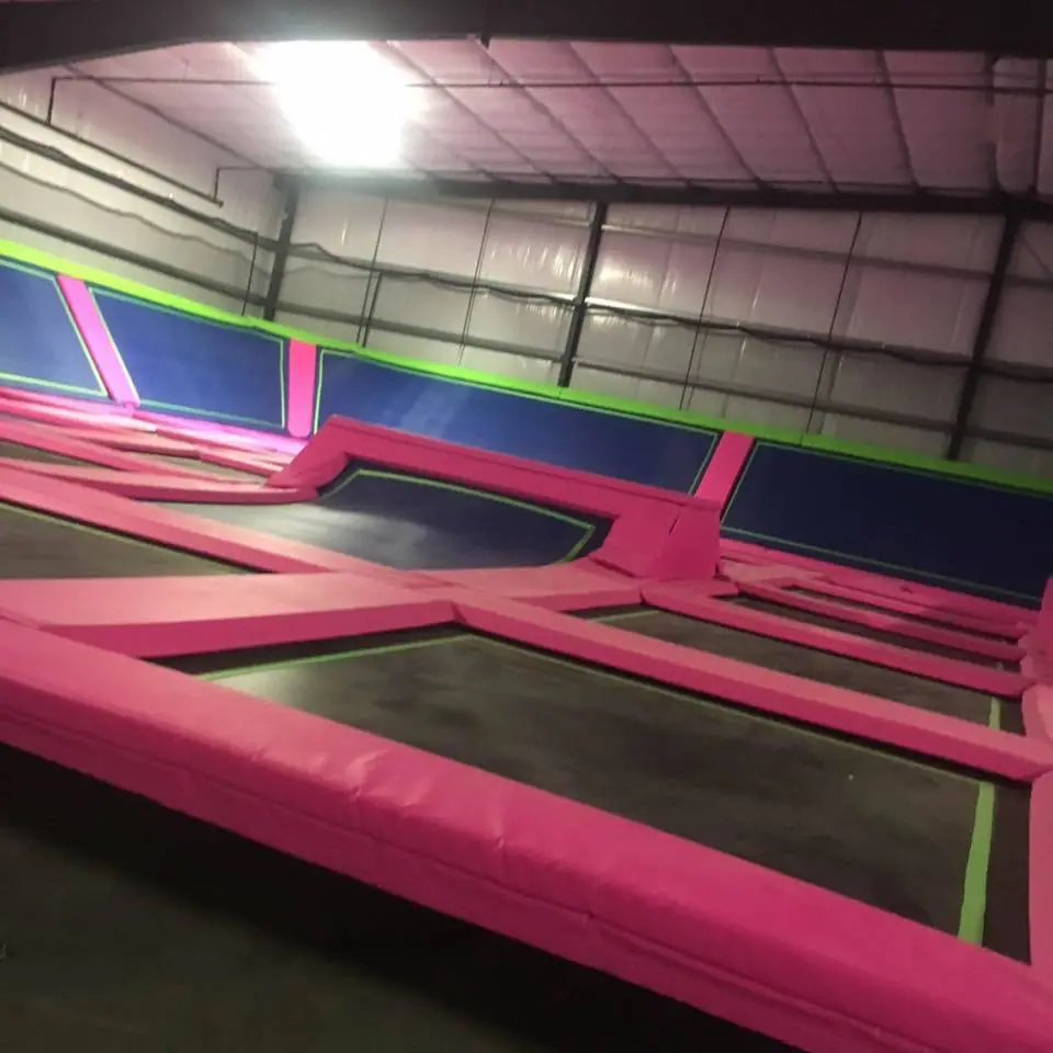 Wall-to-wall trampoline courts at UpSurge Trampoline Park in Tuscaloosa.