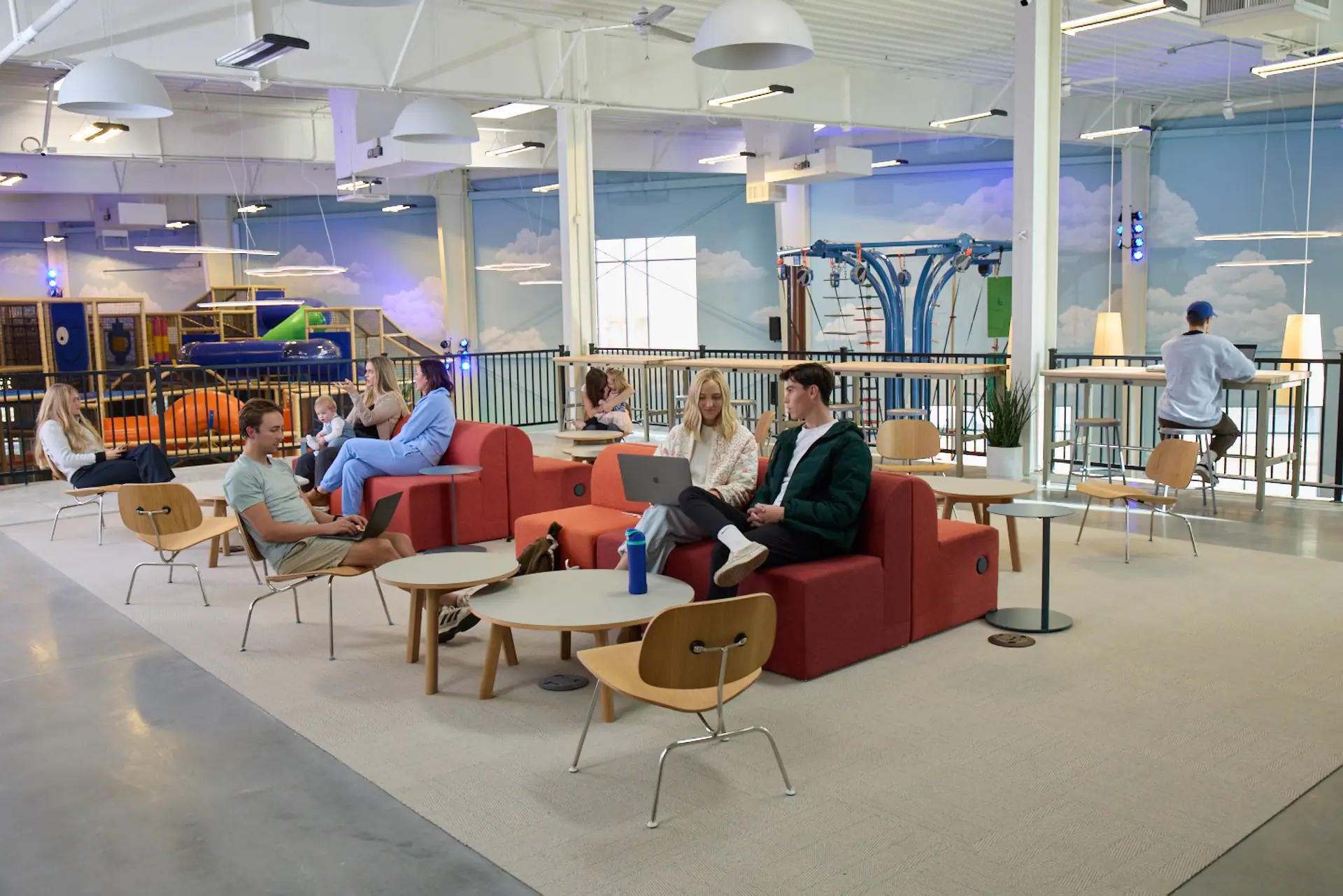 Parent lounge and coworking-style seating at The Big Green
