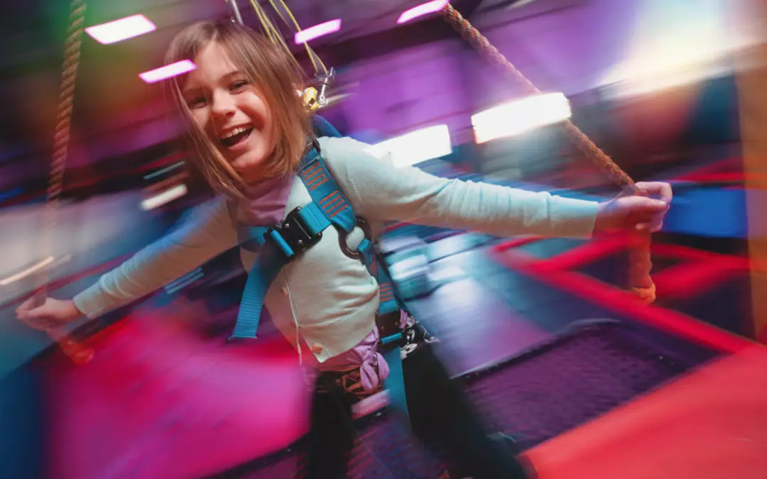 Overhead Sky Rider attraction inside Urban Air Adventure Park in Concord.