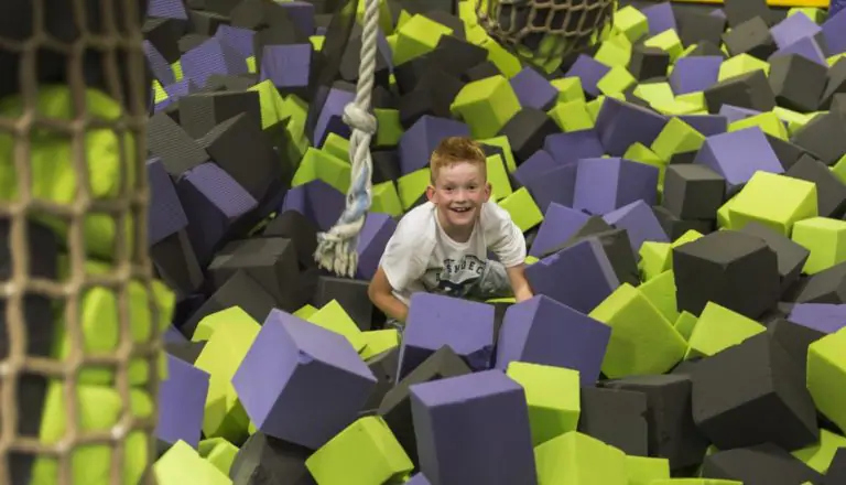 Child inside the foam pit area at Get Air Waterloo.