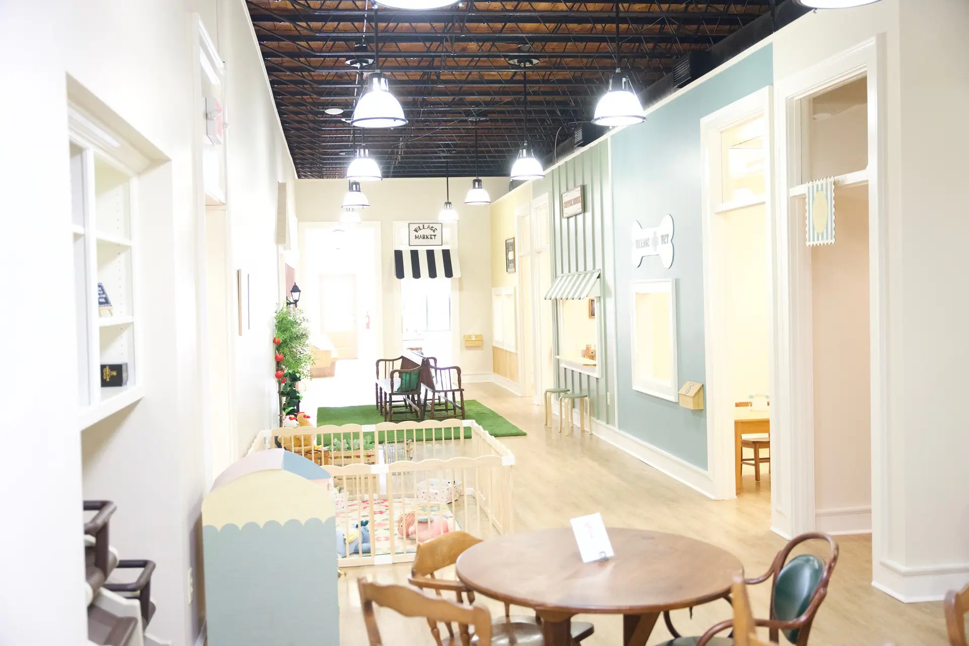 Play area and seating environment at The Little Village on 13th
