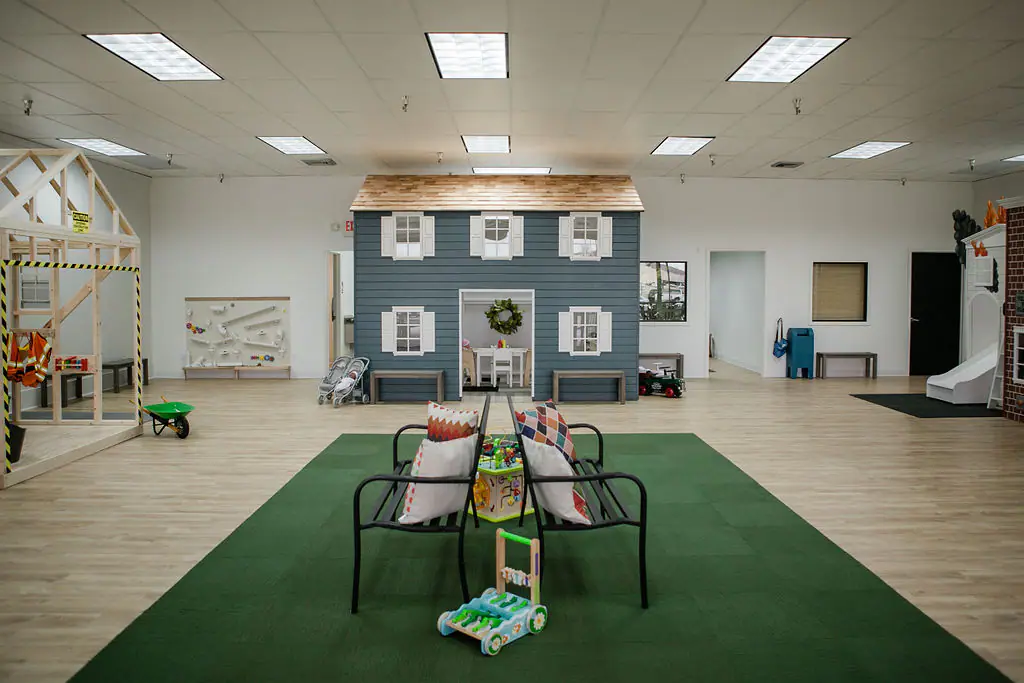 Pretend-play storefront setup inside My Play Village.