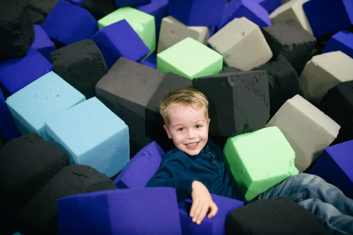 Child using trampoline attractions at Elevate Milan