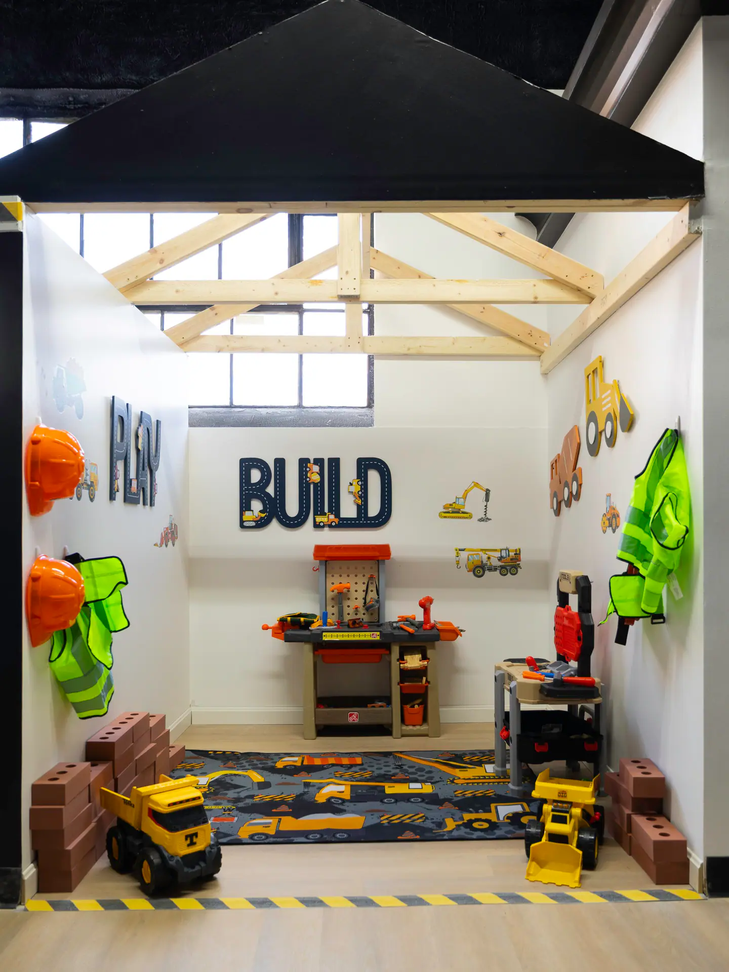 Construction-themed pretend-play room at Little Nuggets.