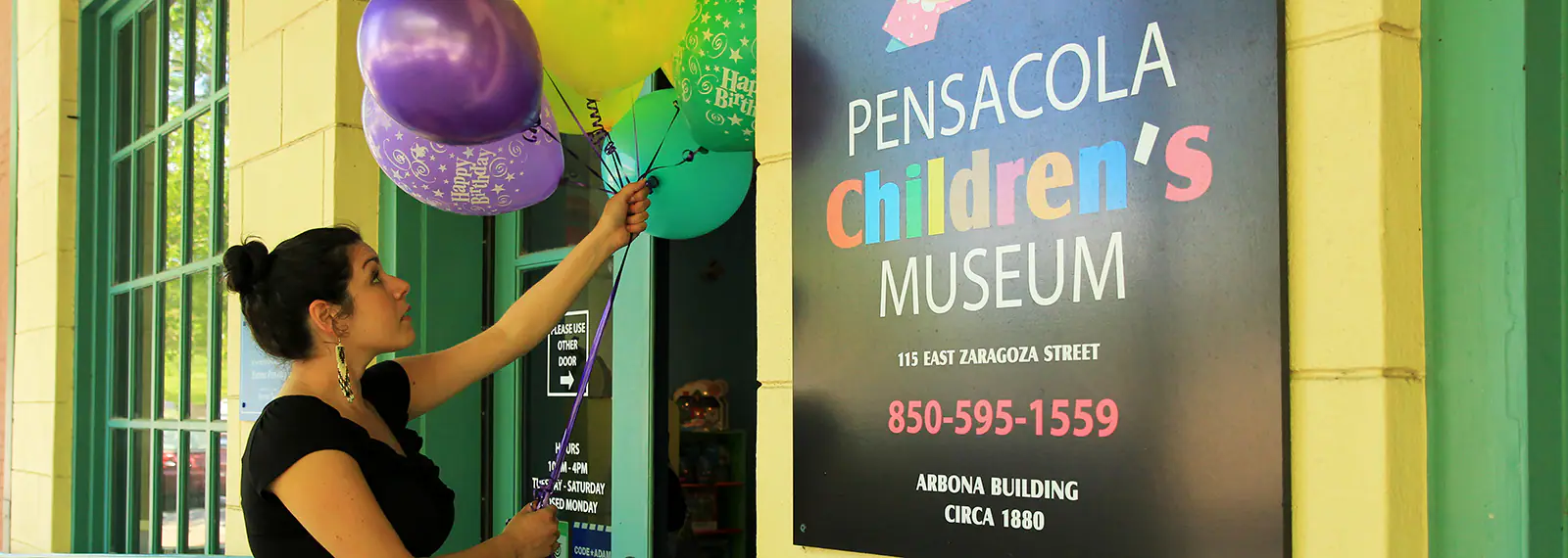 Exterior view and signage for Pensacola Children's Museum in downtown Pensacola.