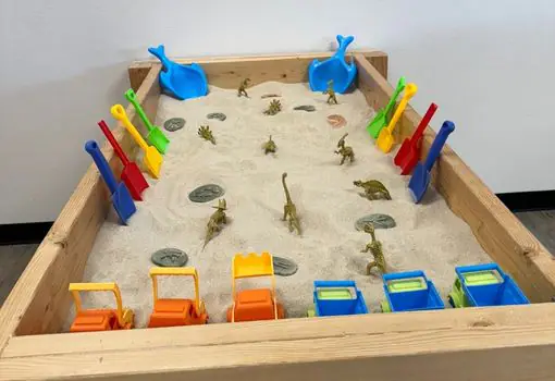 Sensory sand table at Dino Discovery Experience Tri-Cities.