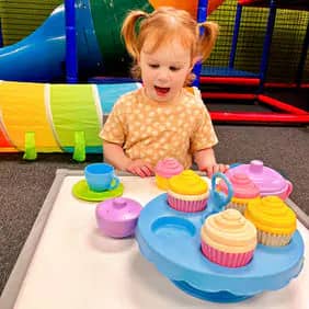 Pretend tea service play area at GO WILD! Family Fun Zone.