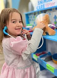 Pretend-play doctor station at Frogs Snails and Fairy Tales.