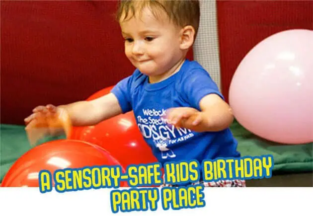 Young child playing in a soft sensory-safe birthday setup.